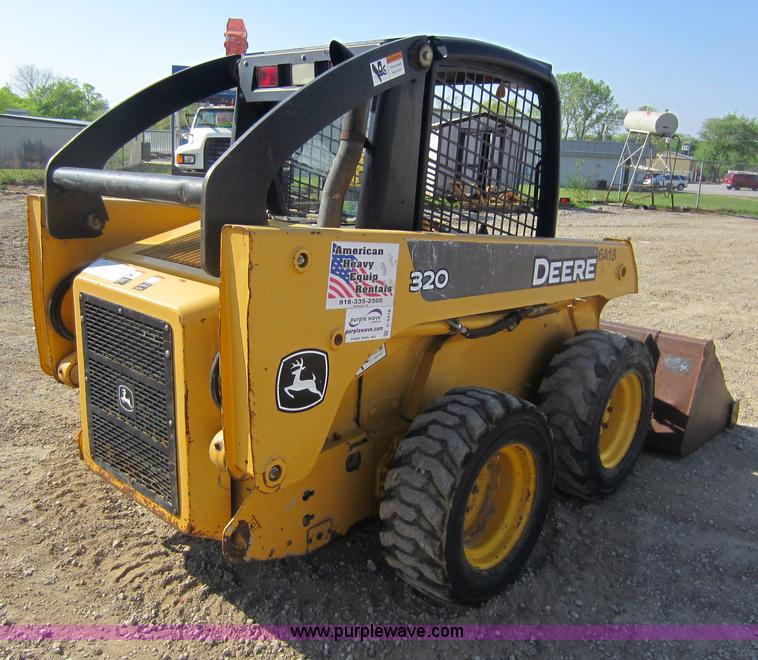 image for item C5418 2005 John Deere 320 skid steer