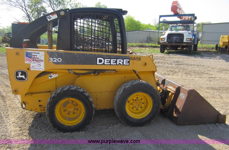 image for item C5418 2005 John Deere 320 skid steer