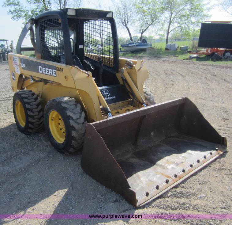 image for item C5418 2005 John Deere 320 skid steer