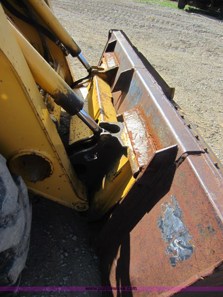 image for item C5418 2005 John Deere 320 skid steer