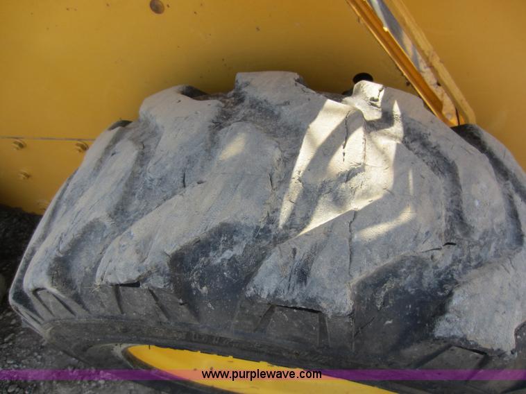 image for item C5418 2005 John Deere 320 skid steer