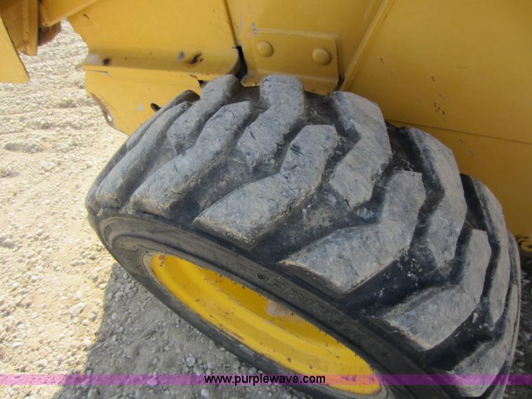 image for item C5418 2005 John Deere 320 skid steer