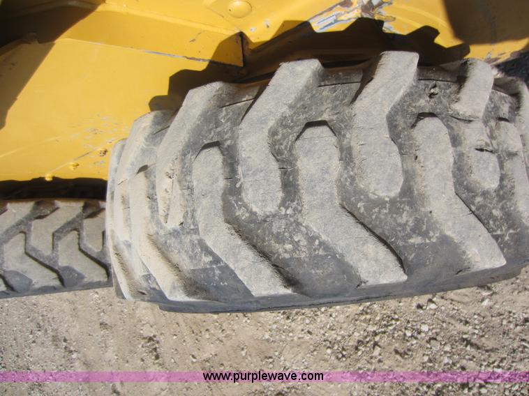 image for item C5418 2005 John Deere 320 skid steer