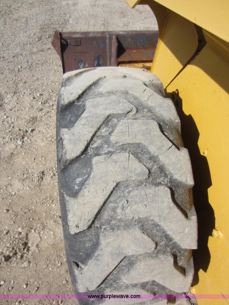 image for item C5418 2005 John Deere 320 skid steer