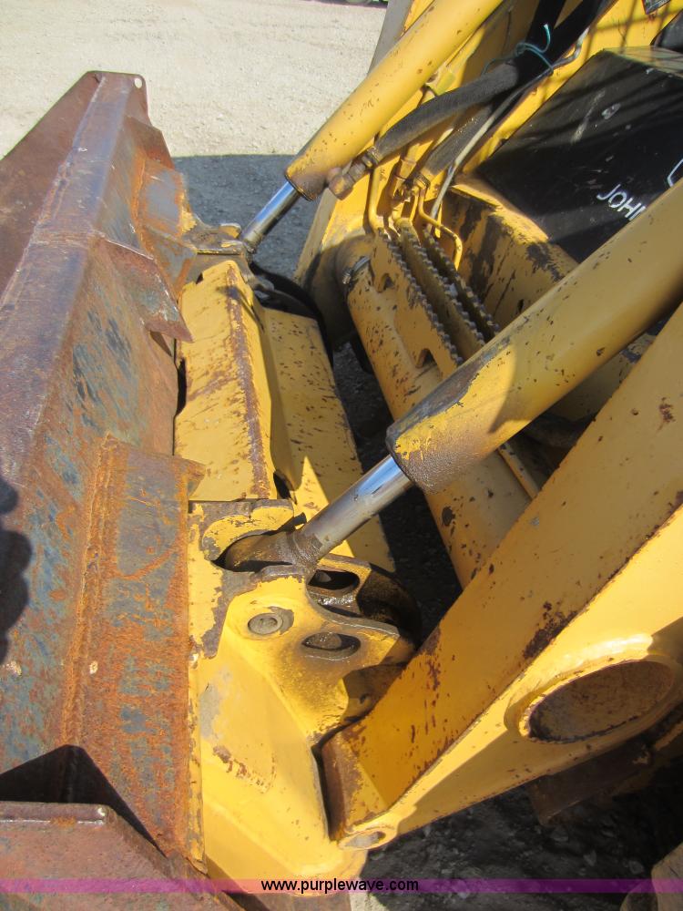 image for item C5418 2005 John Deere 320 skid steer