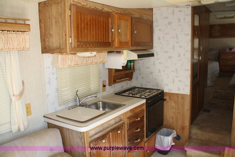 image for item A6604 1990 Nu-Wa Hitchhiker 25' fifth wheel camper