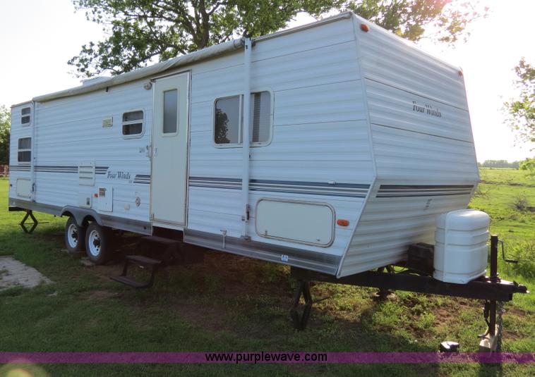 image for item B2278 2003 Fourwinds 31B-DSL 31' travel trailer