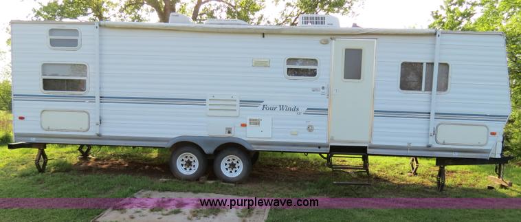 image for item B2278 2003 Fourwinds 31B-DSL 31' travel trailer