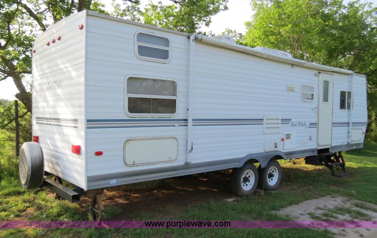 image for item B2278 2003 Fourwinds 31B-DSL 31' travel trailer