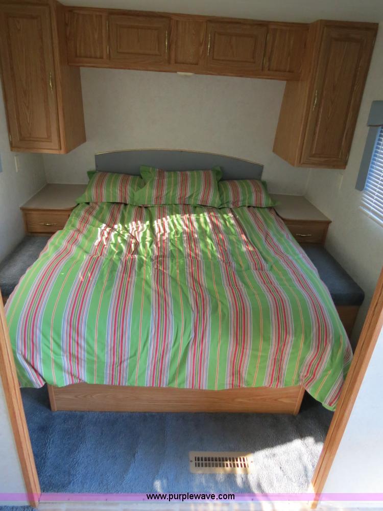 image for item B2278 2003 Fourwinds 31B-DSL 31' travel trailer