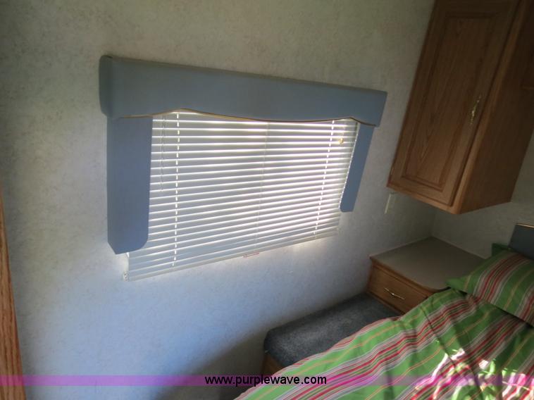 image for item B2278 2003 Fourwinds 31B-DSL 31' travel trailer