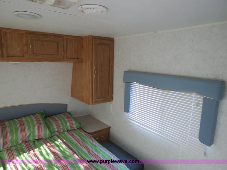 image for item B2278 2003 Fourwinds 31B-DSL 31' travel trailer