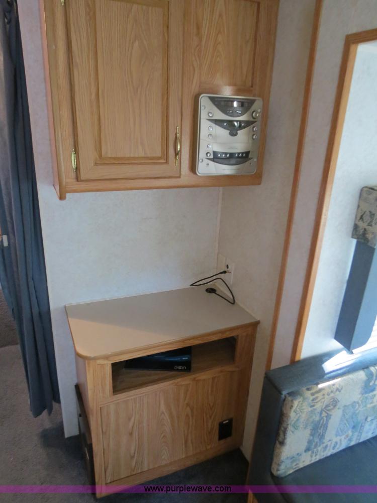 image for item B2278 2003 Fourwinds 31B-DSL 31' travel trailer