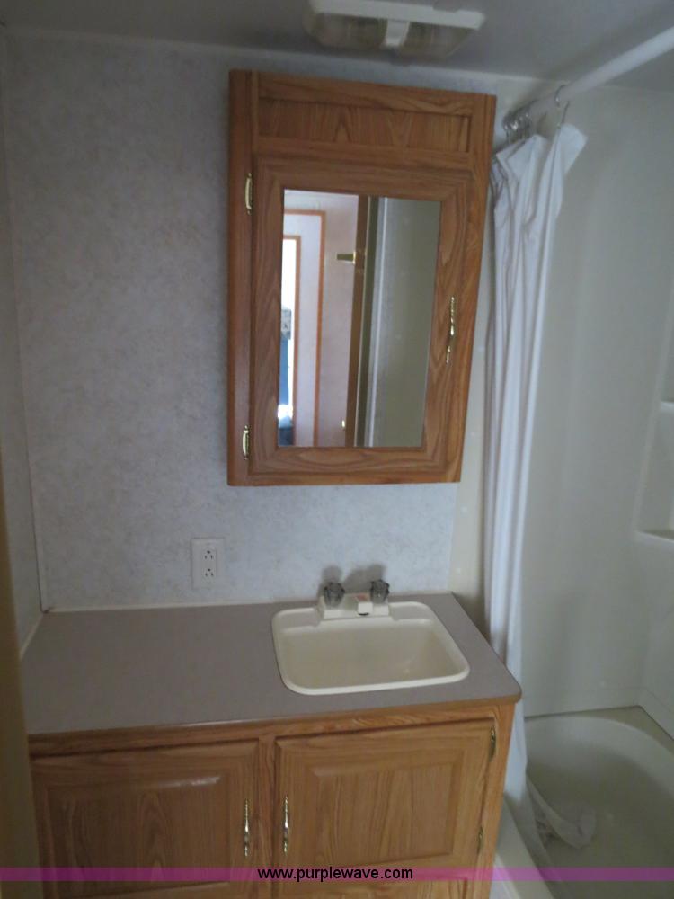 image for item B2278 2003 Fourwinds 31B-DSL 31' travel trailer