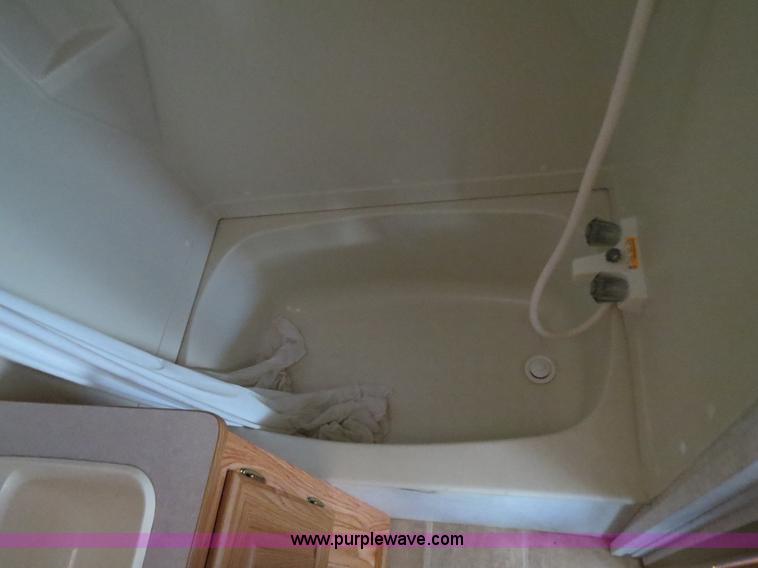 image for item B2278 2003 Fourwinds 31B-DSL 31' travel trailer