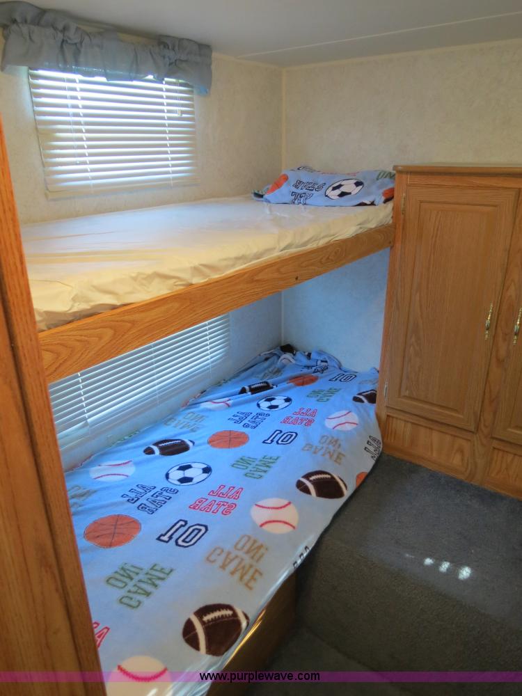 image for item B2278 2003 Fourwinds 31B-DSL 31' travel trailer