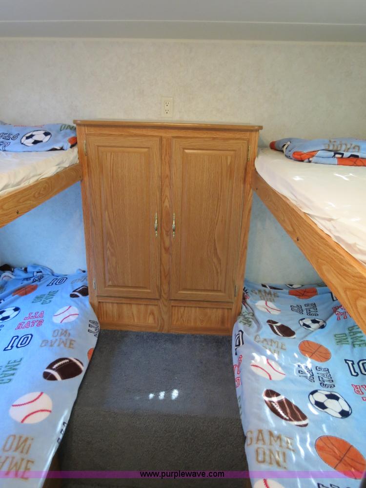 image for item B2278 2003 Fourwinds 31B-DSL 31' travel trailer