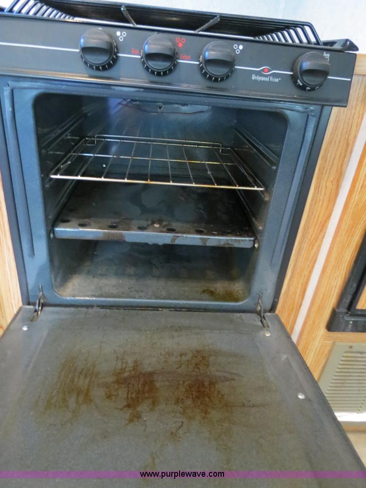 image for item B2278 2003 Fourwinds 31B-DSL 31' travel trailer