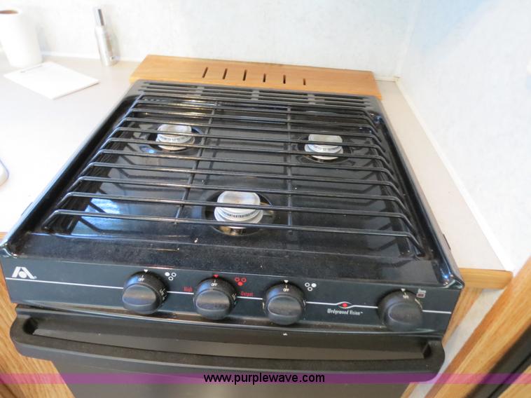 image for item B2278 2003 Fourwinds 31B-DSL 31' travel trailer