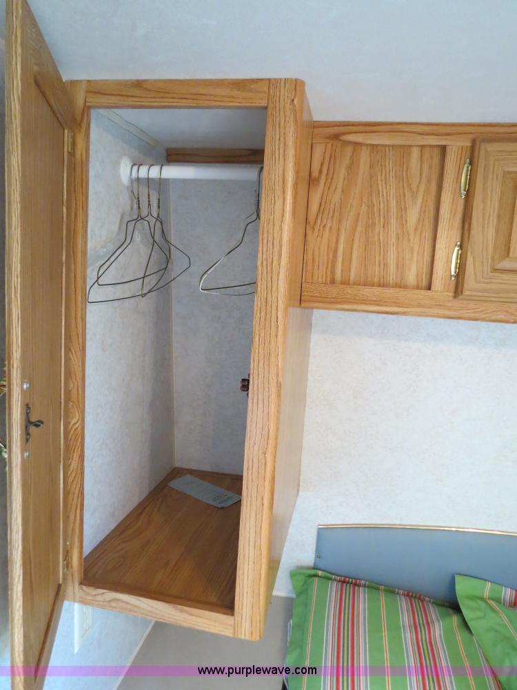 image for item B2278 2003 Fourwinds 31B-DSL 31' travel trailer