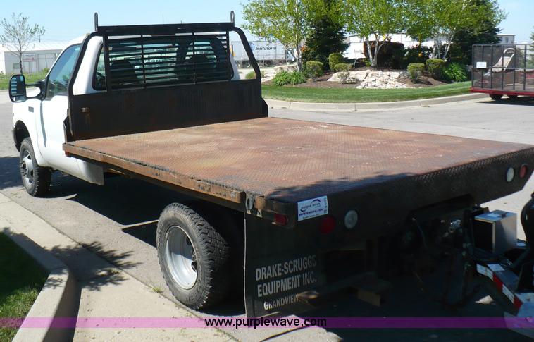 image for item B6323 1999 Ford F350 XLT Super Duty flatbed pickup truck