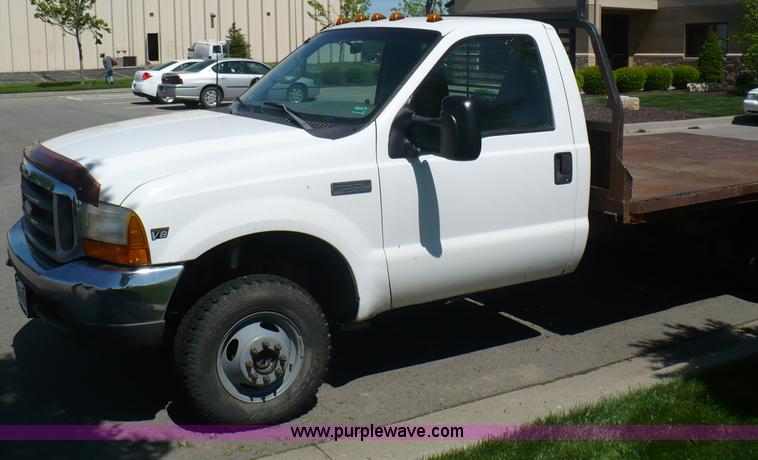image for item B6323 1999 Ford F350 XLT Super Duty flatbed pickup truck