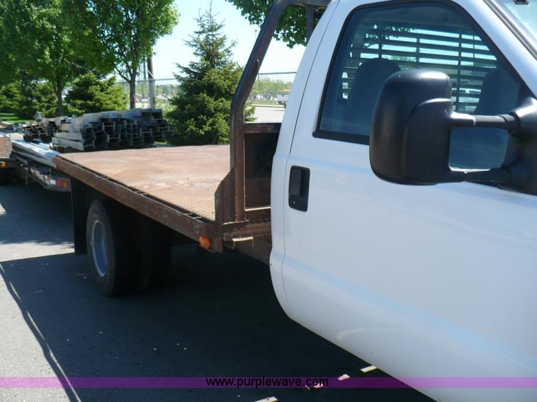 image for item B6323 1999 Ford F350 XLT Super Duty flatbed pickup truck
