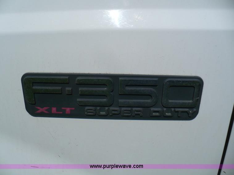 image for item B6323 1999 Ford F350 XLT Super Duty flatbed pickup truck
