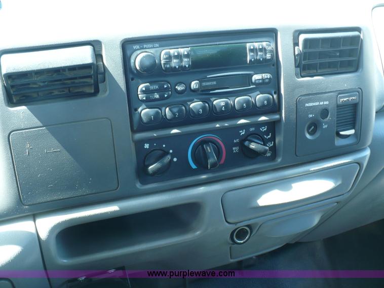 image for item B6323 1999 Ford F350 XLT Super Duty flatbed pickup truck