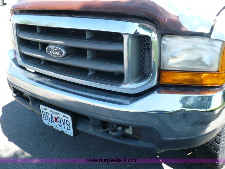 image for item B6323 1999 Ford F350 XLT Super Duty flatbed pickup truck