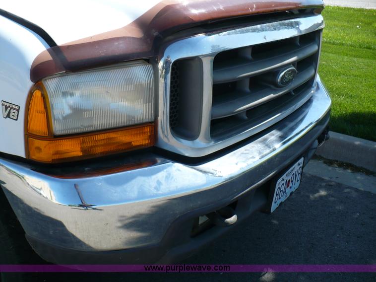 image for item B6323 1999 Ford F350 XLT Super Duty flatbed pickup truck
