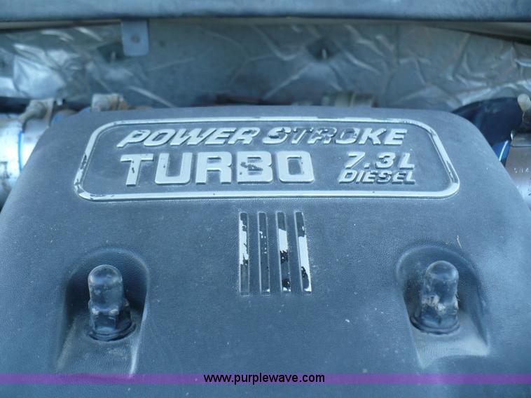 image for item B6323 1999 Ford F350 XLT Super Duty flatbed pickup truck