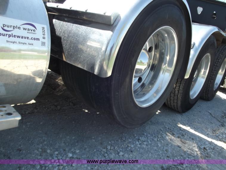 image for item B6326 1999 Kenworth T800 triple axle semi truck