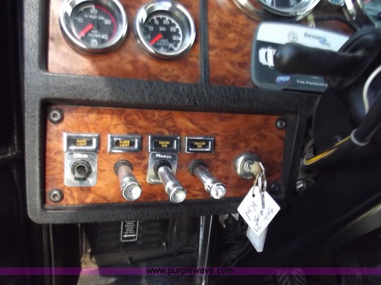 image for item B6326 1999 Kenworth T800 triple axle semi truck