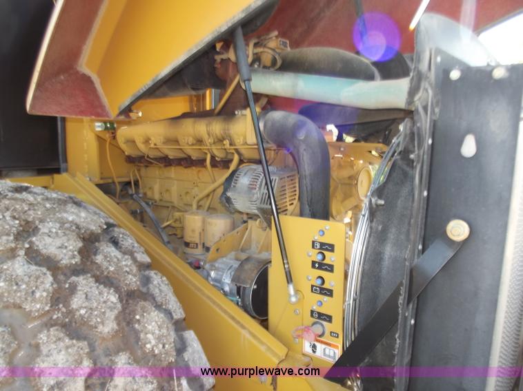 image for item B6343 2007 Caterpillar CS563E smooth drum roller with padfoot kit