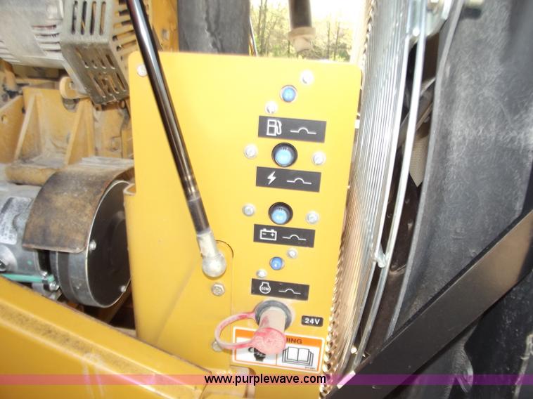 image for item B6343 2007 Caterpillar CS563E smooth drum roller with padfoot kit