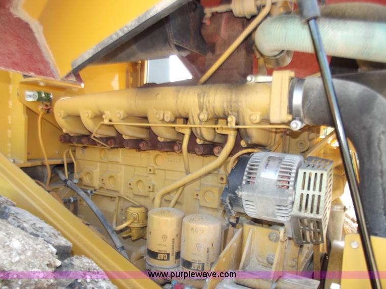 image for item B6343 2007 Caterpillar CS563E smooth drum roller with padfoot kit