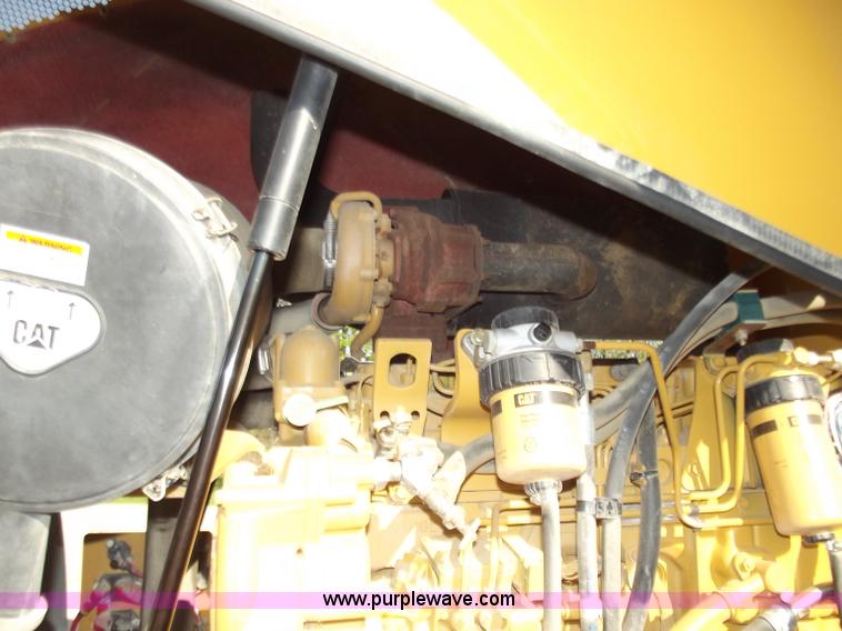 image for item B6343 2007 Caterpillar CS563E smooth drum roller with padfoot kit