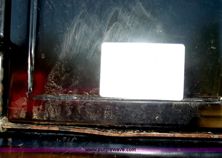 image for item B6343 2007 Caterpillar CS563E smooth drum roller with padfoot kit