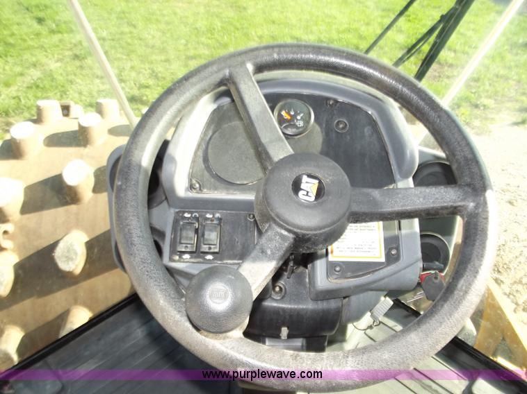 image for item B6343 2007 Caterpillar CS563E smooth drum roller with padfoot kit