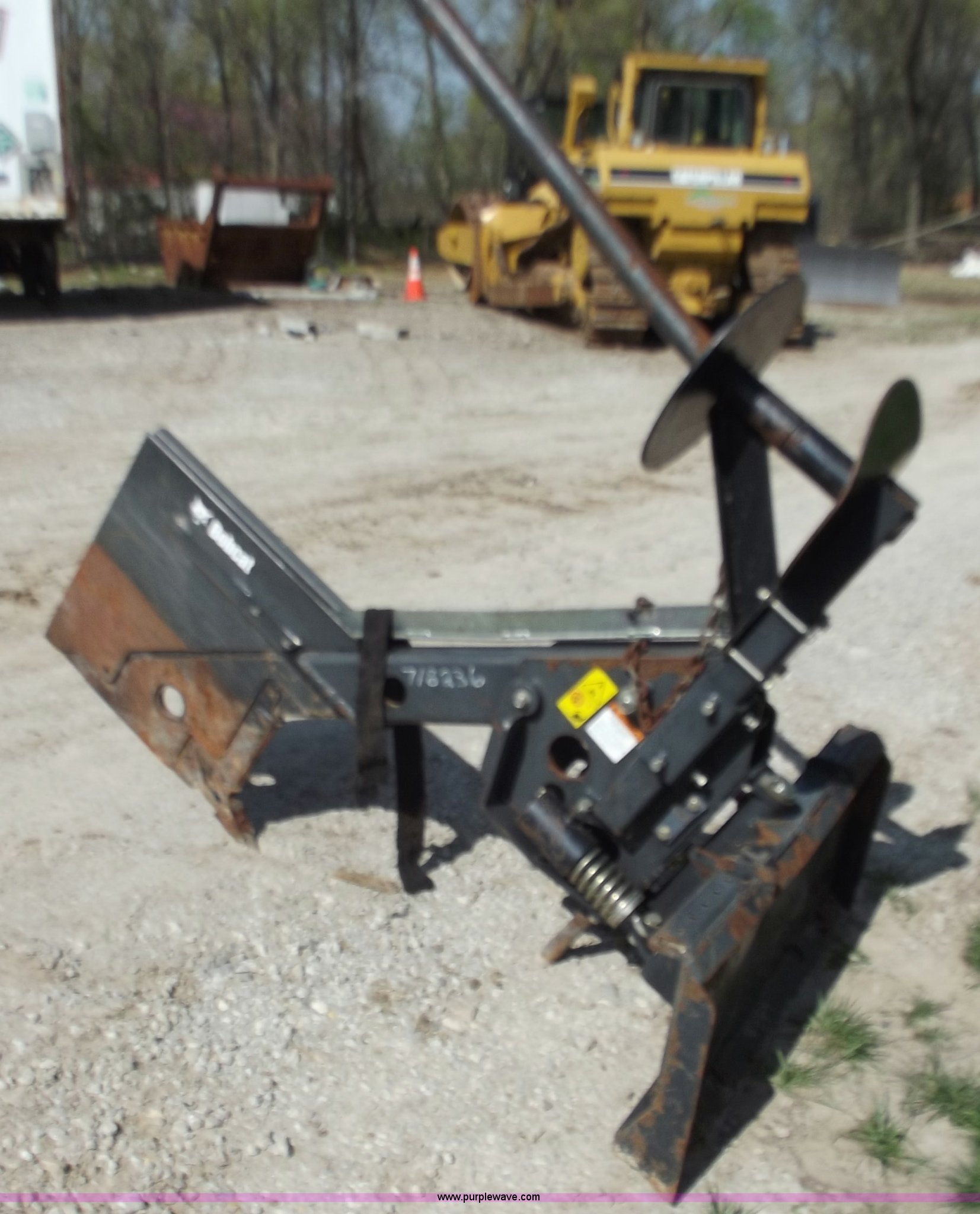 Bobcat skid steer silt fence installer in Greenwood, MO Item B6337