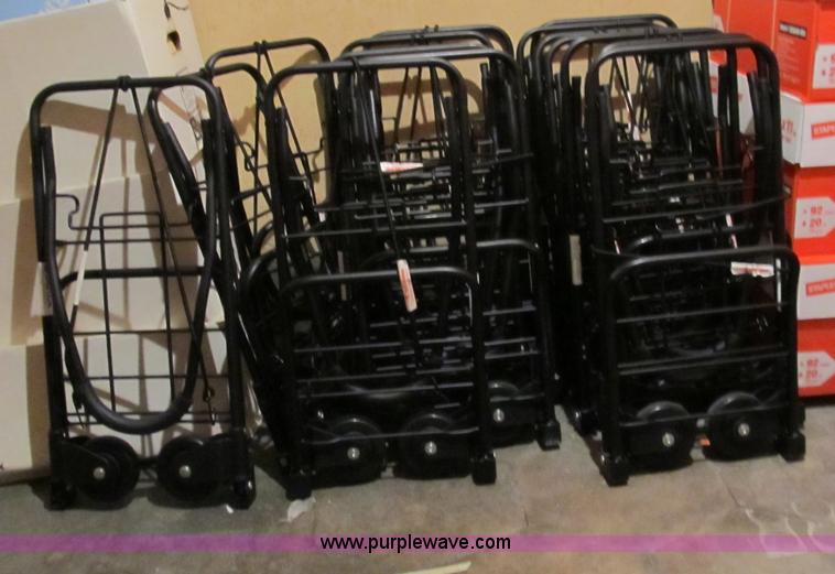 image for item B1227 Approximately 14 suitcase carriers