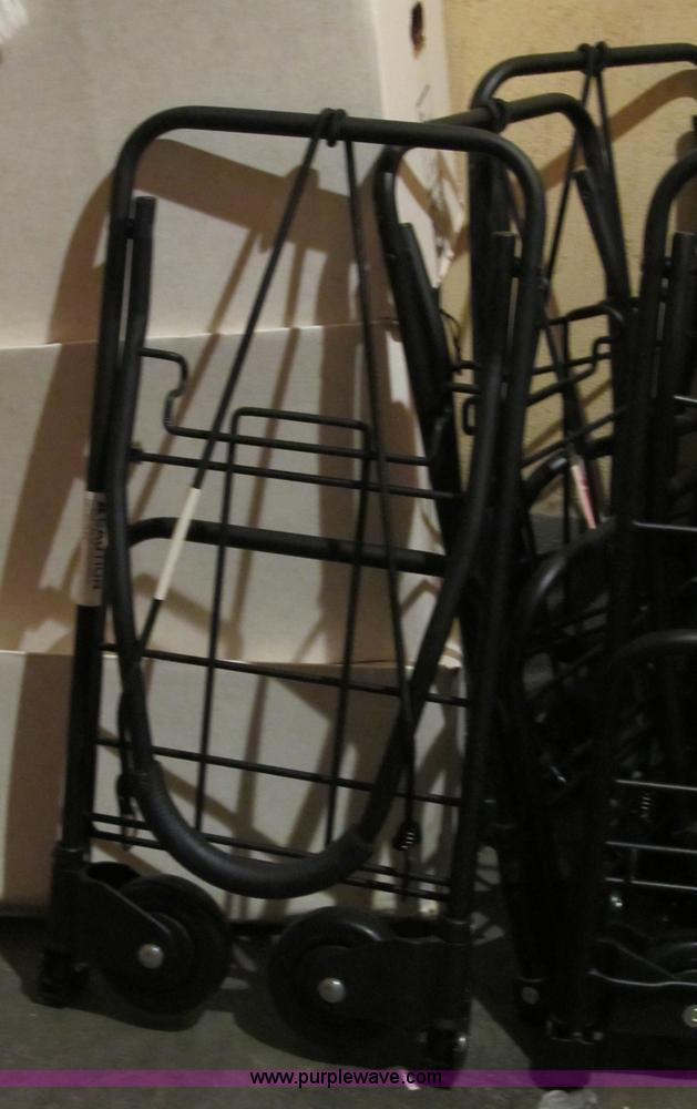 image for item B1227 Approximately 14 suitcase carriers