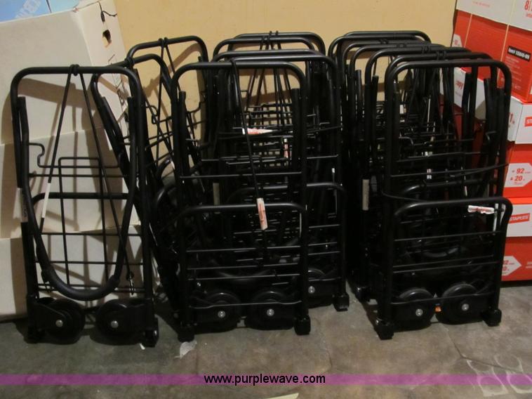 image for item B1227 Approximately 14 suitcase carriers