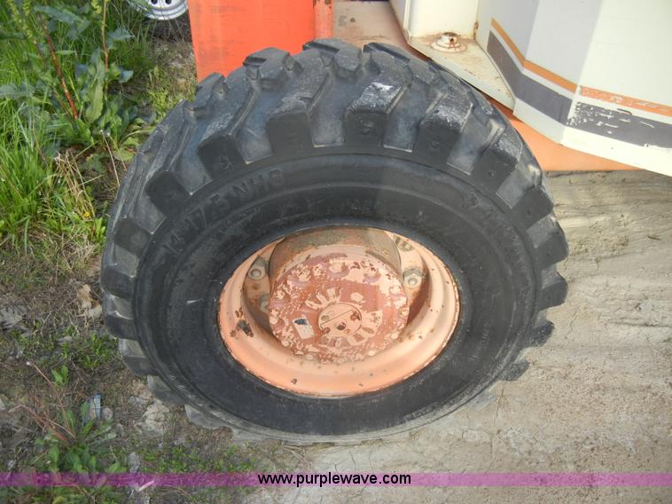 image for item D4019 1991 JLG 60HA TopGun self propelled boom lift