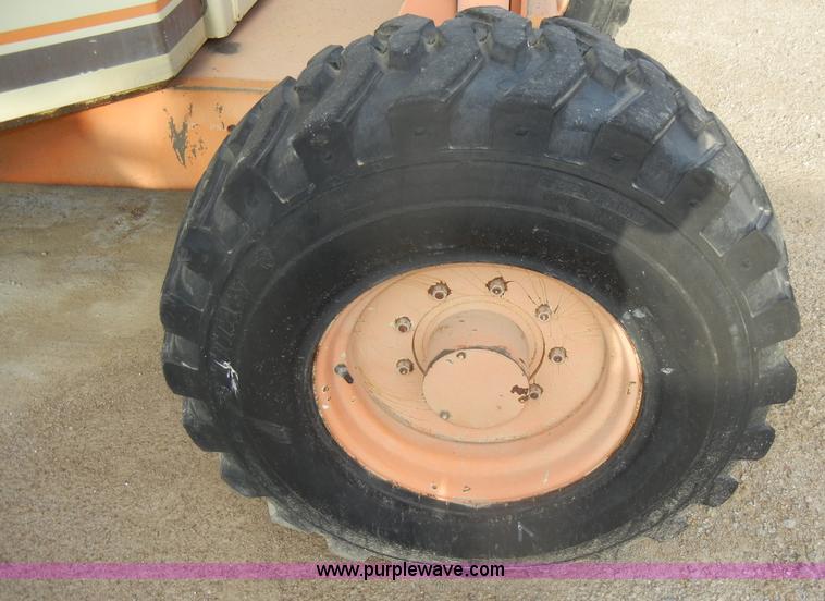 image for item D4019 1991 JLG 60HA TopGun self propelled boom lift