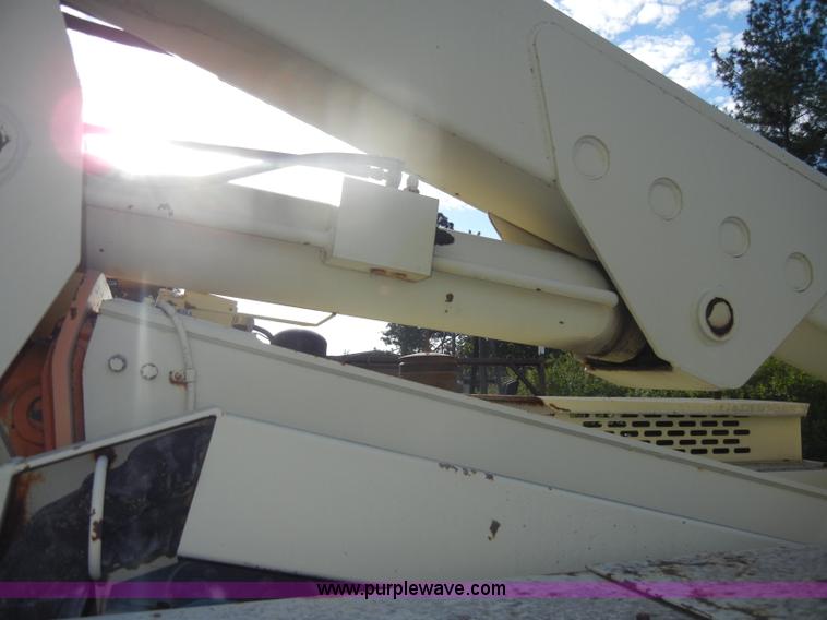 image for item D4019 1991 JLG 60HA TopGun self propelled boom lift