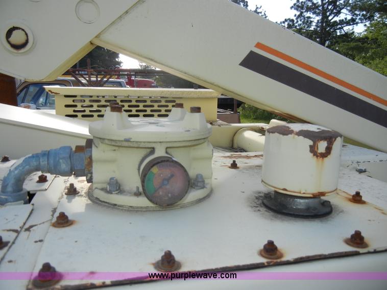 image for item D4019 1991 JLG 60HA TopGun self propelled boom lift