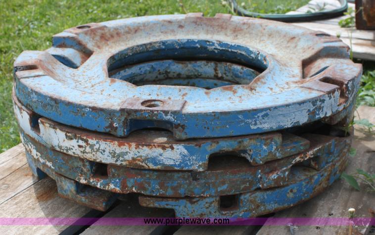 image for item D7689 (4) Ford tractor wheel weights