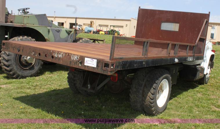 image for item D7697 1979 GMC 6000 flatbed dump truck